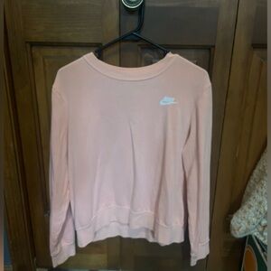 Light pink long sleeve Nike pullover. Size medium. Perfect condition.